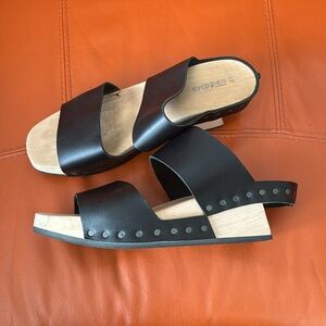 Leather and wooden clog heels